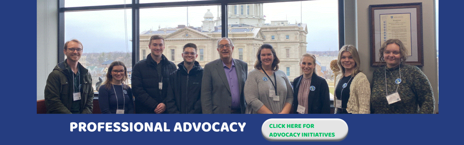 Alt Text: Group of MiOTA members standing in the state capital at Lobby Day