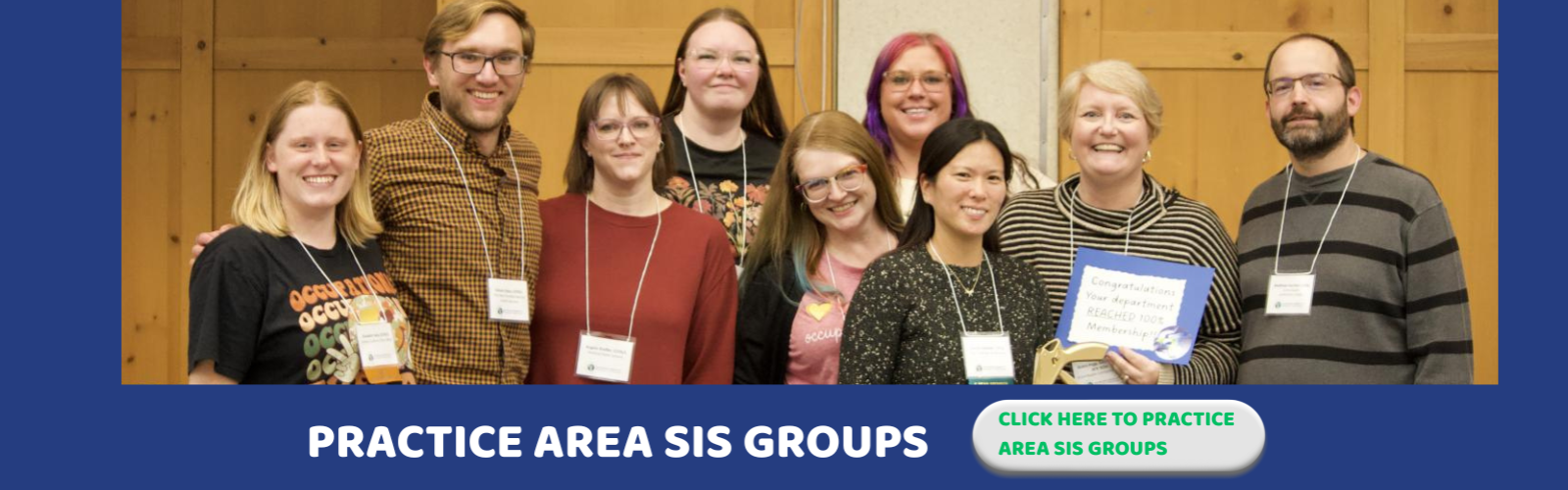 Alt text: Crowd smiling at MiOTA Conference
